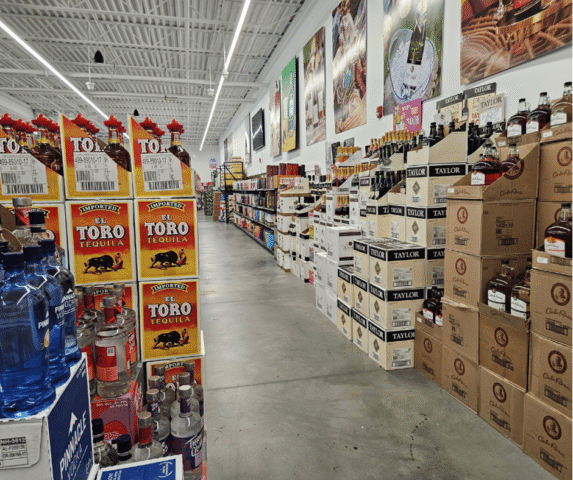 Tri-State Liquor Store Interior Bottle Cases of Beer Aisle